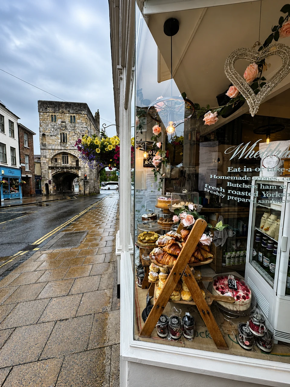Wheldrakes window display with cakes and bakes